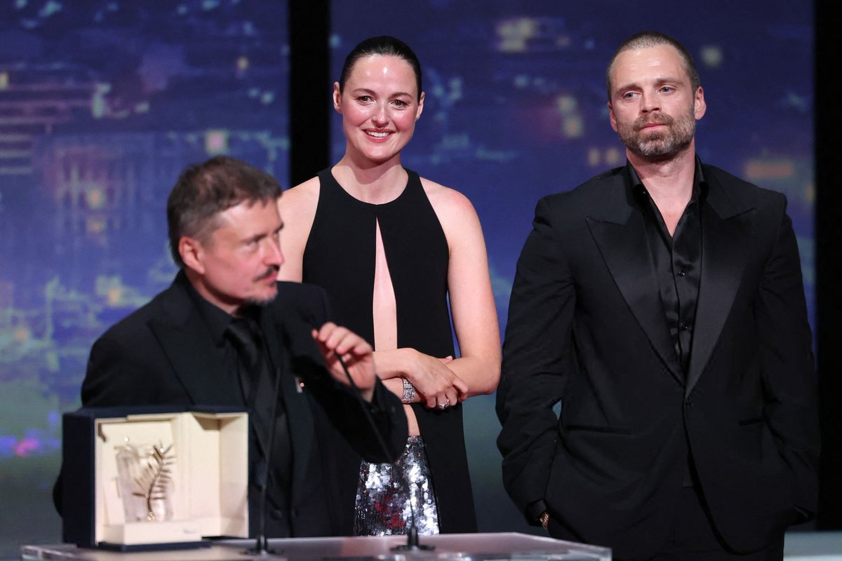 sebstanarchive's tweet photo. Renate Reinsve and Sebastian Stan getting teary-eyed as Cristian Mungiu accepts the Palme d'Or for 'FJORD'. https://t.co/7yoQrje4AT
