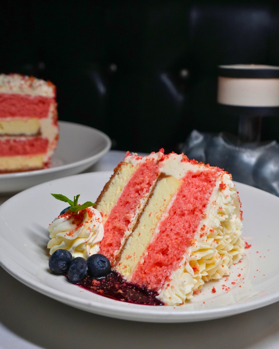 Mortons's tweet photo. Celebrate 250 years of tradition with a dessert crafted to match the moment. 🇺🇸 

Our Liberty Layer Cake features layers of strawberry cake and creamy cheesecake, finished with a delicate vanilla cream cheese frosting. 

Available for a limited time! https://t.co/opFqKs74ad