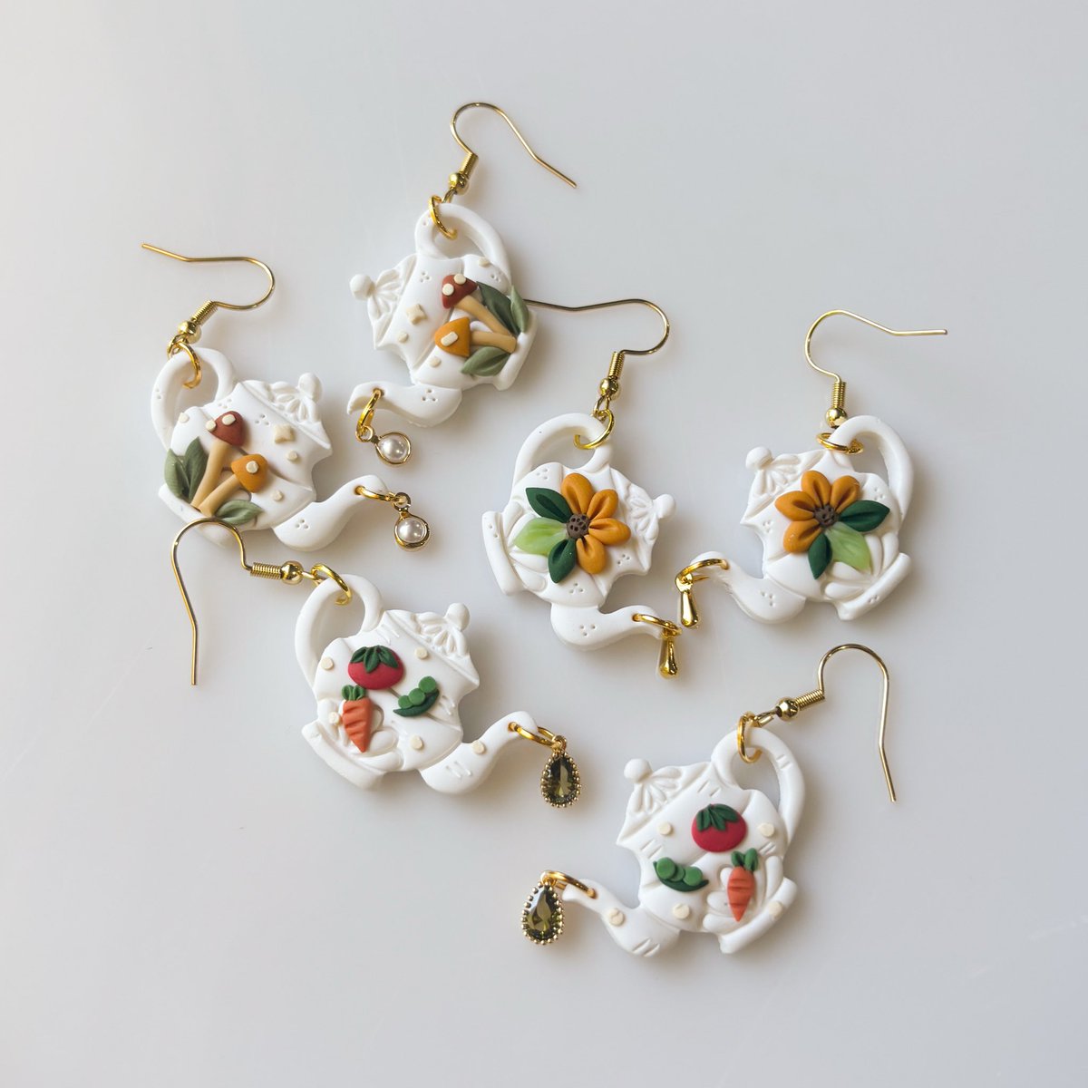 aimee makes earrings • tweet media