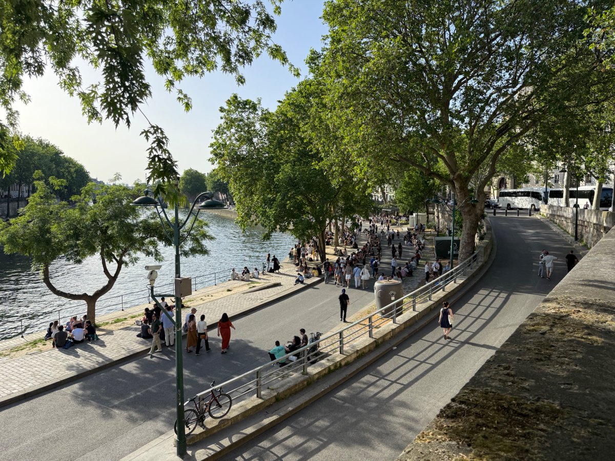 lukeywebo's tweet photo. Evening on the Seine at the site of a former highway, envisioning a future where Austin looks like this: https://t.co/RSKVChl9yw