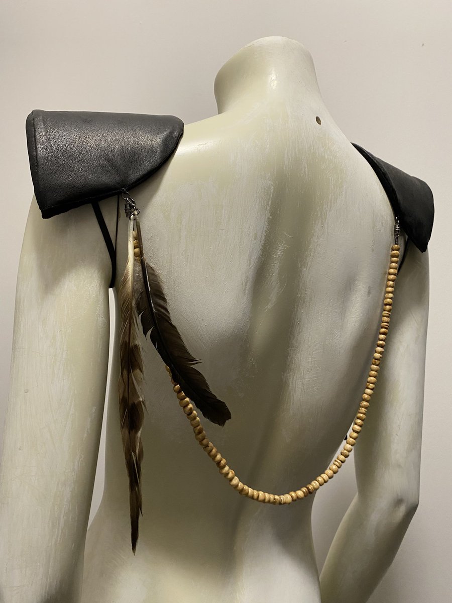 postrelics's tweet photo. CUSTOM LEATHER SHOULDER PADS COMMISSION WITH DETACHABLE TURKEY FEATHERS AND BONE BEADED STRAND THAT CAN BE WORN AS A NECKLACE https://t.co/5M6obt3u8m
