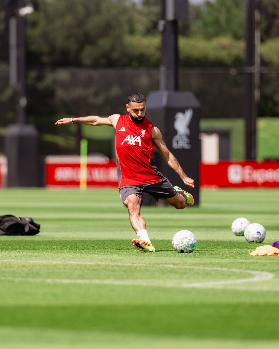 LFC's tweet photo. Go behind the scenes from the AXA Training Centre with Andy Robertson and Mo Salah as the pair train with the Reds for the final time ❤️
