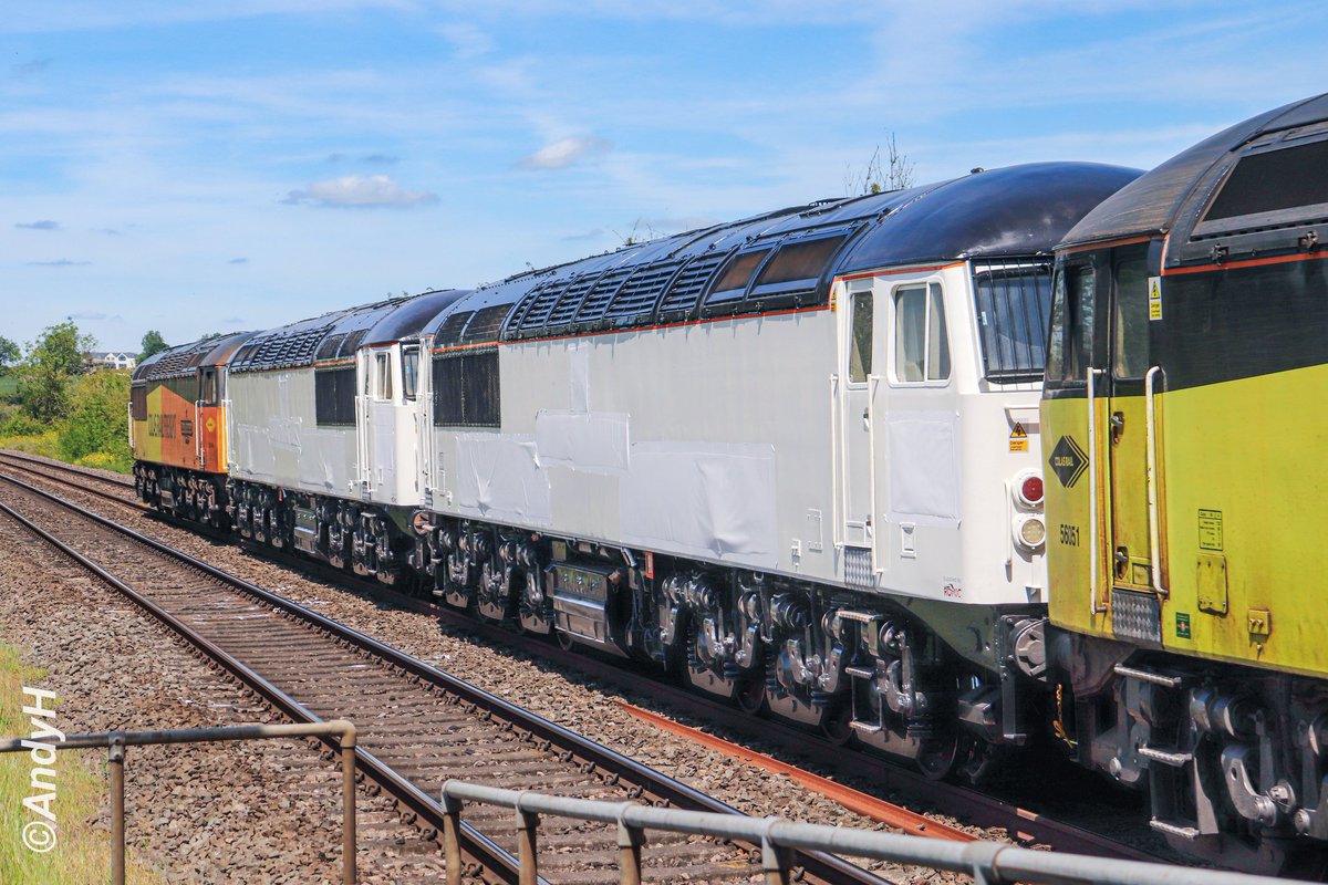 holtona72's tweet photo. No idea which one is which but this is 56302 &amp; 56094 en route to the docks for export to Ghana. 0Z55 Rectory Jn (Colwick Colas) to Marchwood passing a very warm Kings Sutton this lunchtime with @ColasRailUK 56051 leading &amp; 56049 on the rear. #Colas #Romic @C56G2 23/5/26 https://t.co/tp0x2X5gWh