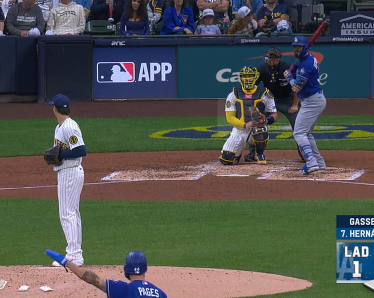 CyrtHogg's tweet photo. Andy Pages may have had Robert Gasser's pitch grips at second base in that fourth inning. Was making motions either to his helmet or holding one arm straight out the entire at-bat to Teoscar Hernandez. https://t.co/zXznJV0hi7