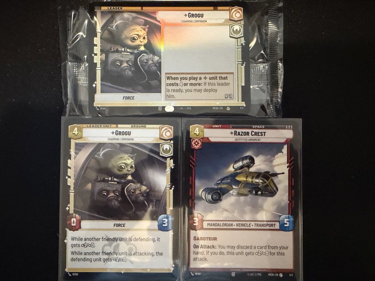 ShadowBalance's tweet photo. Got my opening day Star Wars Unlimited promos! Showing also unopened pack to see other side Grogu card. Fun additions and Mandalorian was an awesome movie! https://t.co/M1bgOsiyoN