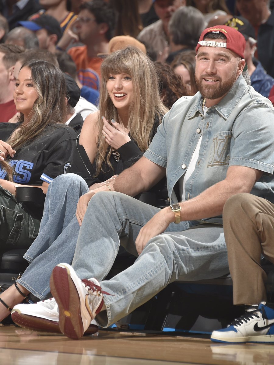 NBAKicks's tweet photo. Travis Kelce joins Taylor Swift courtside in Cleveland (LIVE on ABC) in the “MVP” Nike LeBron 7! #NBAKicks https://t.co/Cax9GiIBX2