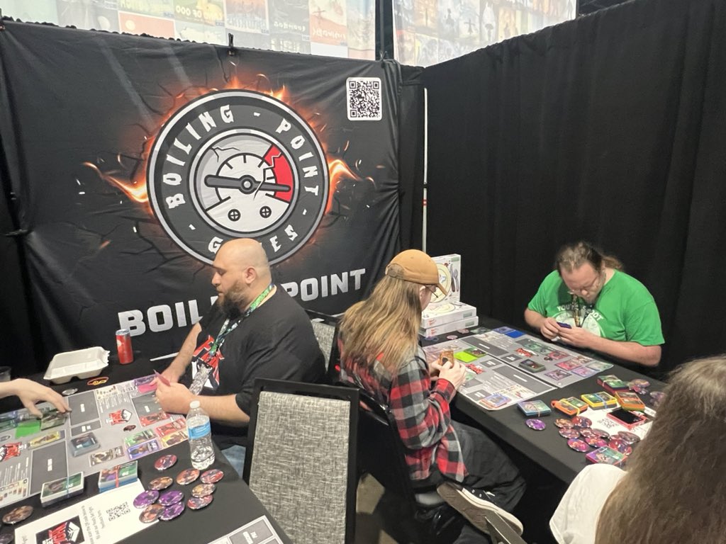 jchensor's tweet photo. I meant to Tweet out yesterday that o had a chance to stop by the Ready Set Fight exhibition table at Combo Breaker.

It’s a card game that is trying to replicate the feel of a Fighting Game, and I encourage everyone at Combo Breaker to stop by and give it a try. It’s pretty fantastic. It’s right next to the main command center table in the main exhibition hall.

I only played one game and one character, but the potential seems so high for new characters and really cool variety and ways to take advantage of the mechanics. I played the Grappler, of course. 😏

Unlike most Card Games, it’s not a collection pay-to-win game. It’s just more characters being released. And it’s very much a mental game and reading opponents with very little RNG because I even won my first game against the creator and got a souvenir Token as a prize! ^_^

So I do encourage people to stop by and try the game out at Combo Breaker if you can!