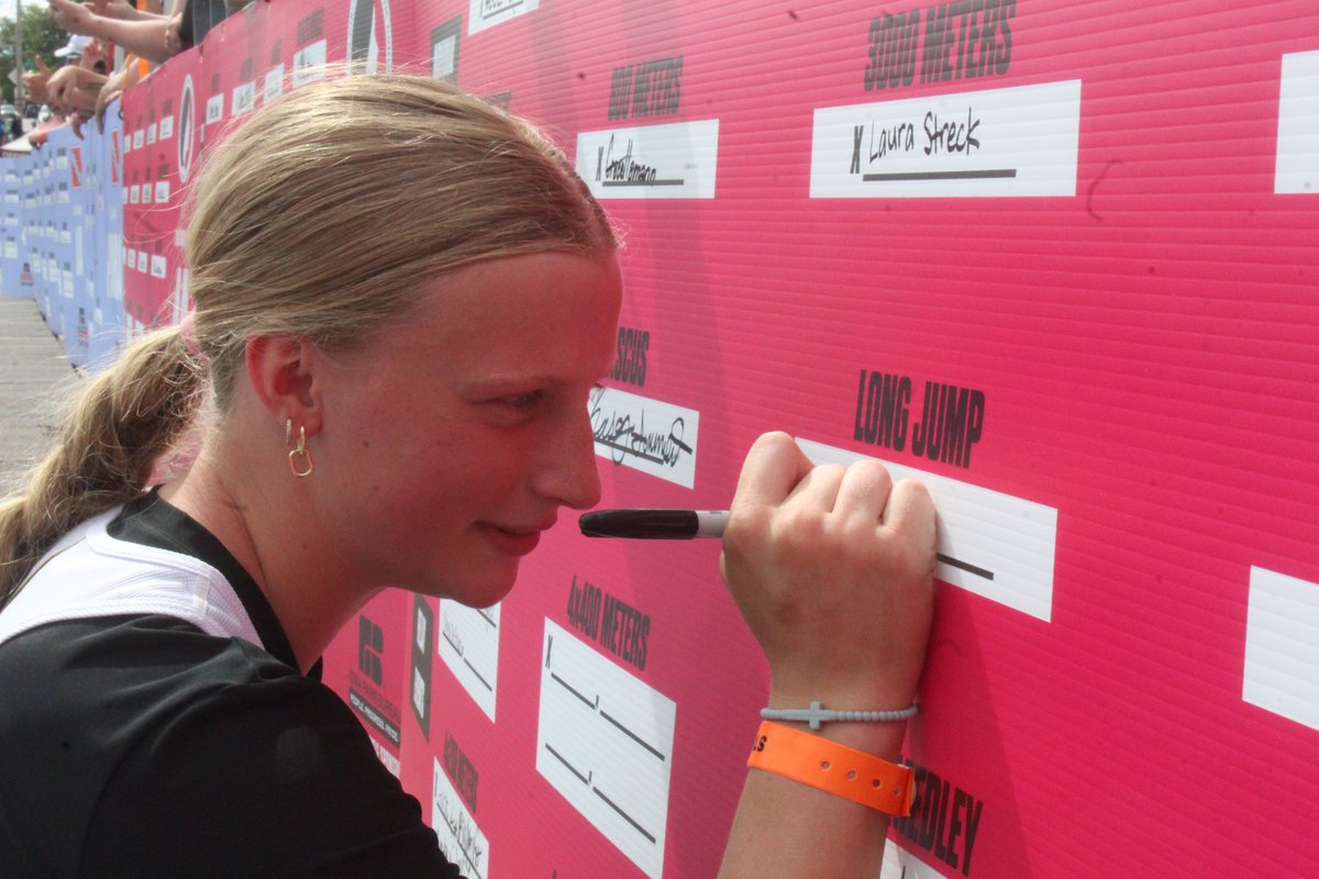 bowkerpaul's tweet photo. A moment every high school track &amp; fielder dreams about: Mid-Prairie soph (and now state champion) Jeorgia Evans signs the state championship board at Drake Stadium as 2A girls long jump champion. She won the Golden Hawks' only individual state title. @TheNews_Sports @MPHawksVB https://t.co/qWaLBpUcY9