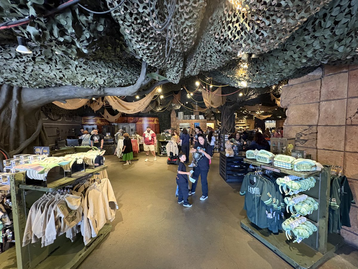 2SnapsX's tweet photo. At the Star Wars trading post downtown Disney, Grogu merch everywhere, store basically empty. https://t.co/HHnxg1miA4