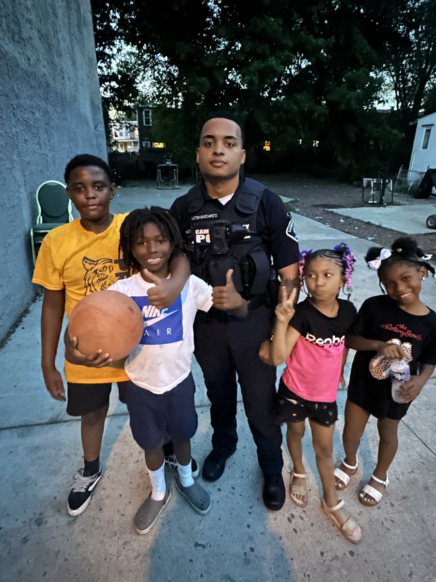 CamdenCountyPD's tweet photo. Officer Matos-Garcia with some new friends in Whitman Park! #unitypolicing https://t.co/XUsn1147JD