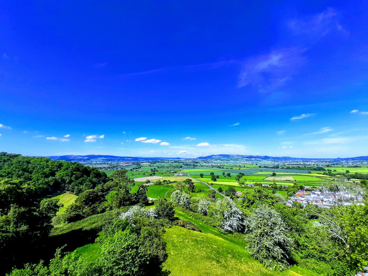 GavTheGaffer's tweet photo. Summer in the Shires. The view from Montgomeryshire Castle, looking towards the Shropshire border. And a dead straight Roman road that seems to go on forever. Glorious weather here this weekend https://t.co/1uzza9fCKF