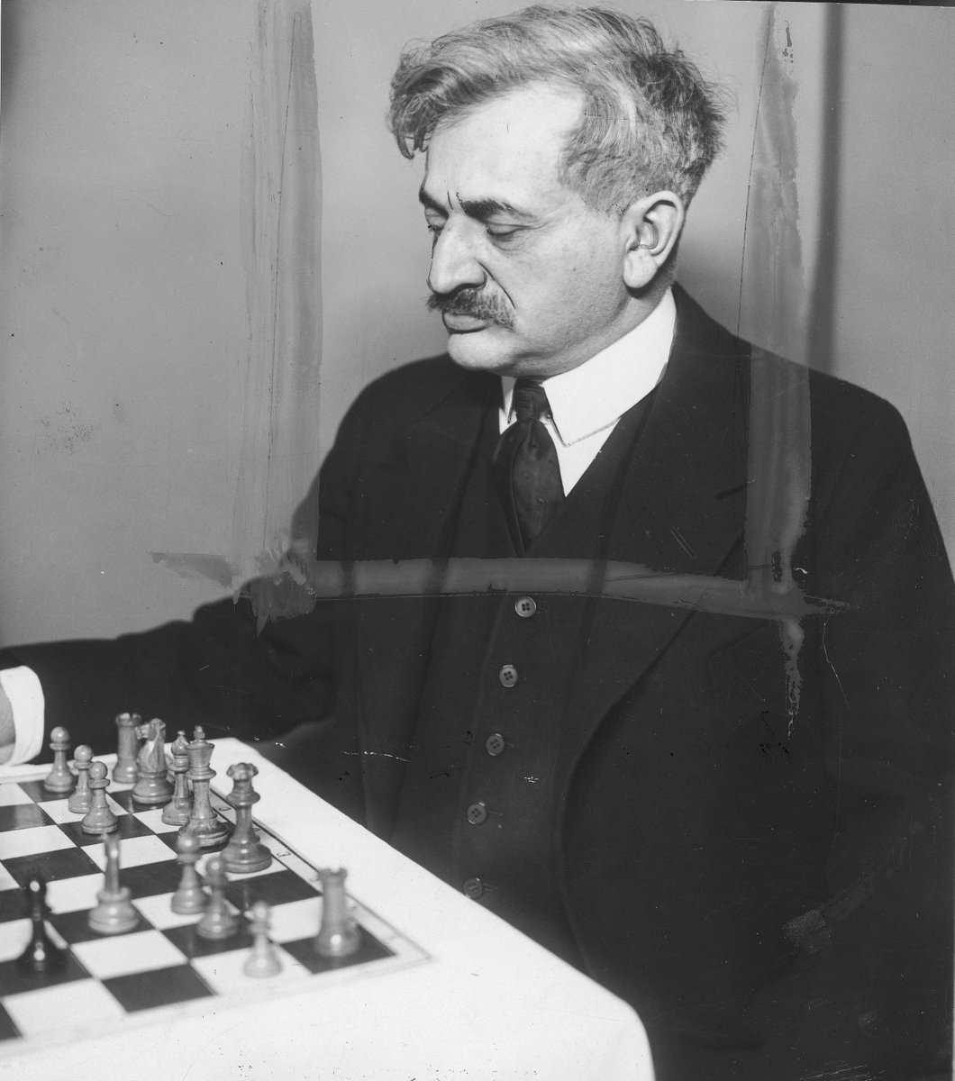 dgriffinchess's tweet photo. Via the Polish online archives (https://t.co/4kibQMmv9O), a photo of the 2nd World Champion, Emanuel Lasker (1868-1941).
Lasker held the title of World Champion for over a quarter of a century. #chess https://t.co/qlxnx8OGoZ