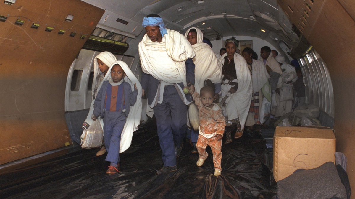 ExposingHamas's tweet photo. This day in history - Operation Solomon begins: Within just 36 hours on May 24-25, 1991, more than 14,300 Ethiopian Jews were covertly airlifted from Addis Ababa to Israel, saving them from civil war and famine

In 1991, Ethiopia had been embroiled in a decades-long civil war and was facing a famine. Rebel forces were advancing toward Addis Ababa and the Jews there, causing grave concern among Israeli and American-Jewish agencies on the ground in Ethiopia. Diplomats negotiated a deal with the Ethiopian government, and covert operations were arranged to enable evacuation at a moment’s notice.

After President George H.W. Bush sent a letter to the new Ethiopian President, Tesfaye Gebre Kidan, an agreement was reached on May 23, allowing Jews to leave Ethiopia all at once. Operation Solomon started the next day and a few days after the Operation was completed, Addis Ababa fell to the rebels.

In total, 35 aircraft were involved in Operation Solomon. One plane broke and holds the Guinness world record for the most passengers on an aircraft. All the seats had been removed, and at least 1,078 people were on board, including two babies born in-flight.

The Jewish Agency along with the Government of Israel were the main players in planning and executing Operation Solomon, working alongside and supported by organizations including the Israel Defense Forces, the American Joint Distribution Committee, the American Association for Ethiopian Jews, the Jewish Federations of North America (then UJA) and more.

https://t.co/bCpD1NFR9Q