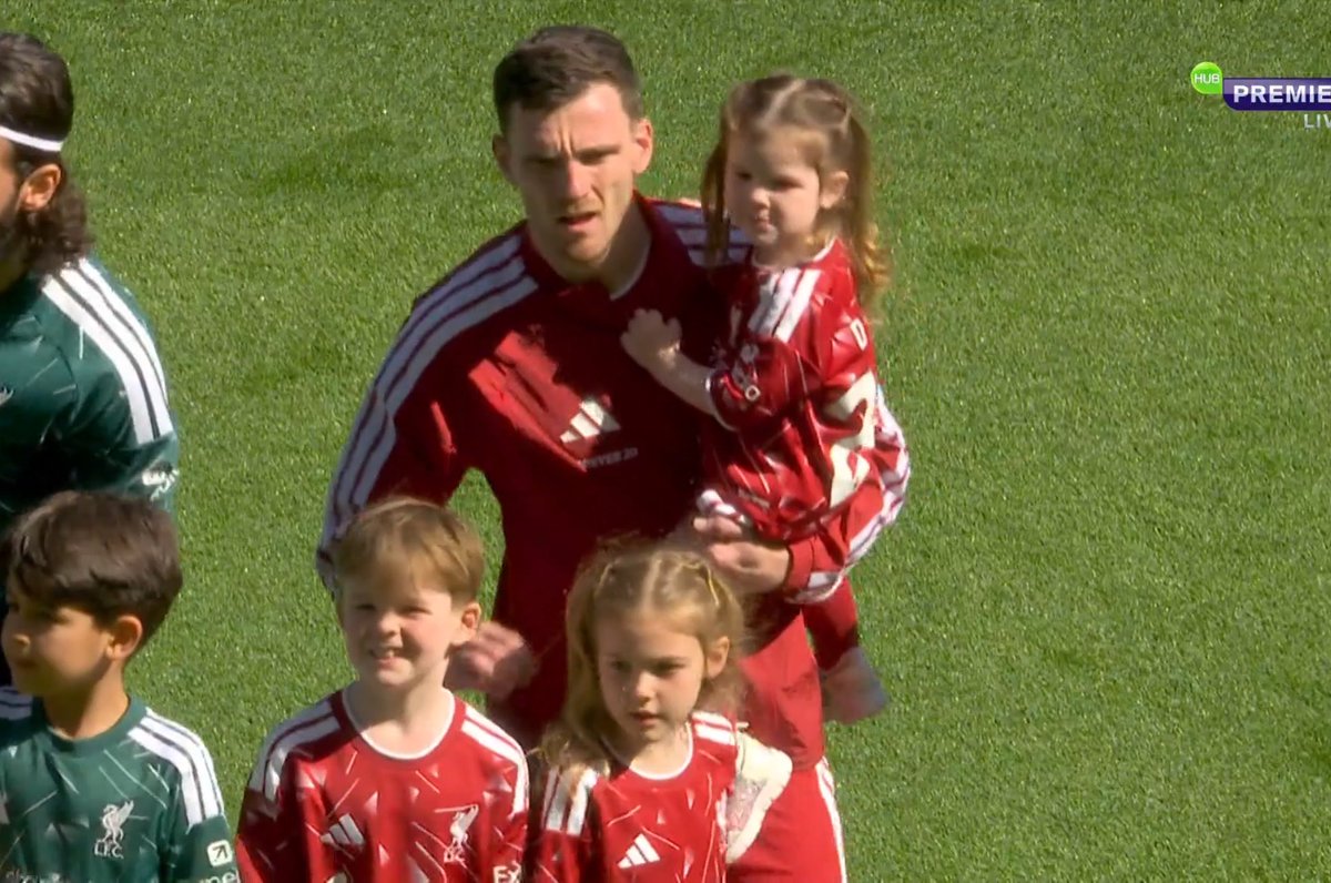 Andy Robertson arrives with his three children.