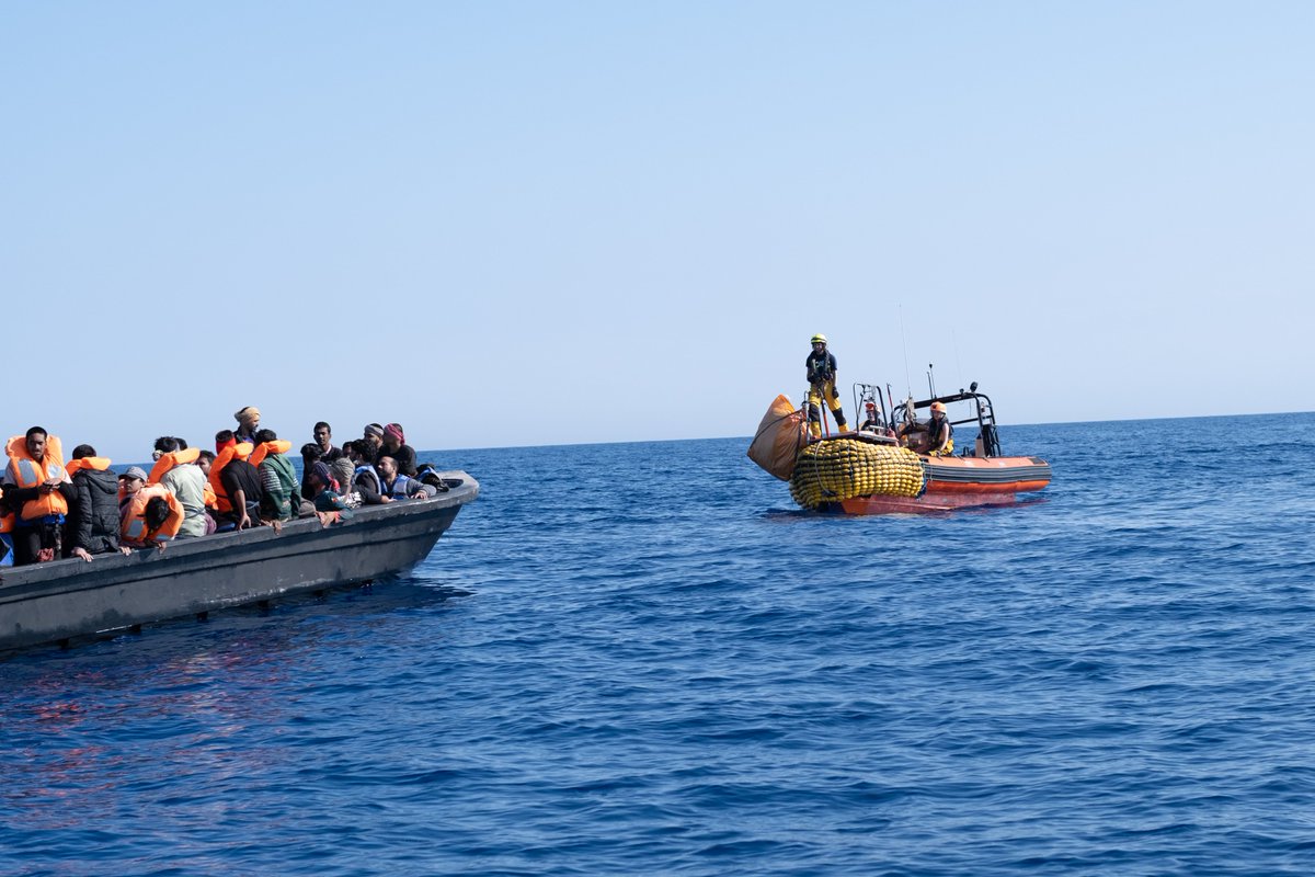 SOSMedIntl's tweet photo. This morning, the #OceanViking rescued 68 people from an overcrowded fiberglass boat in distress spotted from the bridge, in the #MalteseSAR. Survivors reported spending 24 hours at sea after departing #Libya. Many were found exhausted and dehydrated. They are now safe on board. https://t.co/7vWJl3aJGS