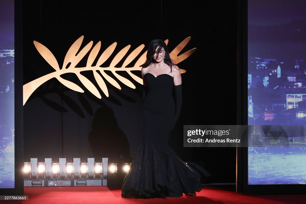ForNadineLabaki's tweet photo. Emmanuel Marre accepts the Best Screenplay Award for "A Man Of His Time" from Nadine Labaki on stage during the closing ceremony of the 79th annual Cannes Film Festival. https://t.co/oElLBKatzN