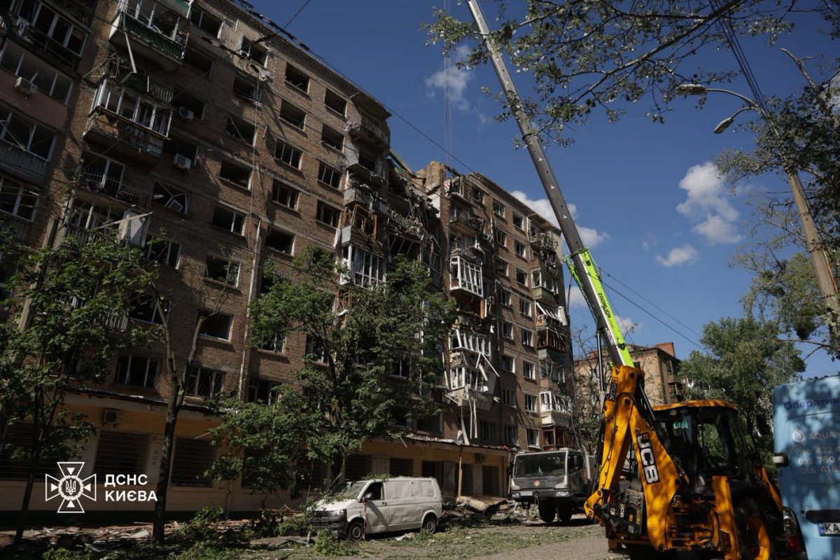 BohuslavskaKate's tweet photo. At least 2 people were killed in russian attack on Kyiv last night.  Almost 70 are known to be injured so far. Search and rescue operation continues‼️ https://t.co/5dVT6lIXrt