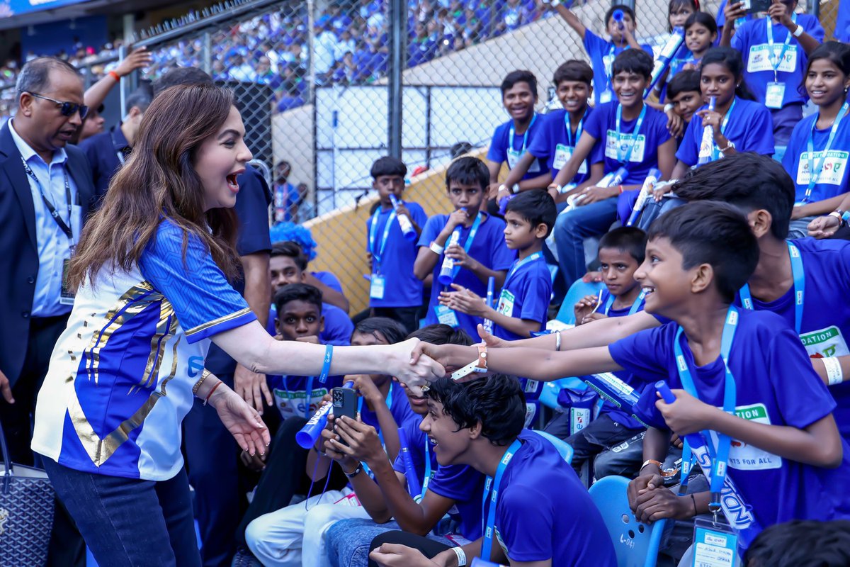 ril_foundation's tweet photo. On #ESADay, Mrs. Nita Ambani, Founder & Chairperson, Reliance Foundation, joined children in the stands for the special annual match outing at the #MumbaiIndians game 💙

An evening filled with cheers, excitement and unforgettable memories for 20,000 children. The happiness in these frames says it all 📈✨ Education and Sports for All.

#MumbaiIndians #OneFamily #ESAMatchDay
