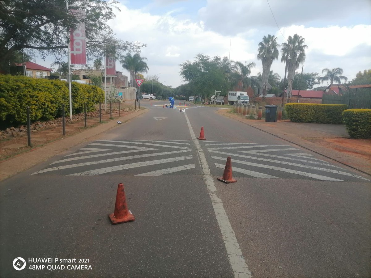 LemoSebo's tweet photo. Road marking at the intersection of Dr van der Merwe Road and Amandelboom Road in Ward 96, Doornpoort is improving road safety and enhancing visibility for motorists and pedestrians in the area.
#TshwaneWorks #ServiceDelivery #ActionSA https://t.co/wrn9HJ03si