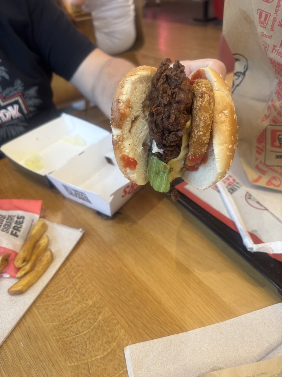 nuvverjam's tweet photo. Disappointed in @KFC_UKI waited 45 minutes for these! How can the chicken be burnt to a crisp yet be lukewarm? Answers on a postcard please https://t.co/Vyo4T6jpkL