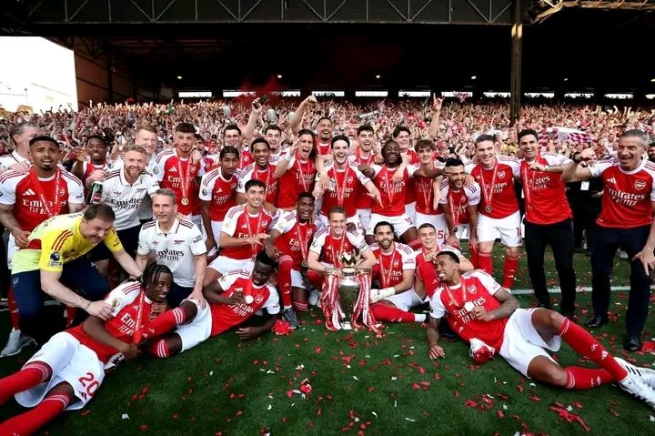 FT_Screamer's tweet photo. CHAMPIONS OF ENGLAND! 
22 years of hurt washed away in pure glory. What a team. What a squad. What a moment. North London is RED and the trophy is OURS! Thank you to every single Gunner who never stopped believing #AFC #PremierLeagueChampions #COYG https://t.co/kMXk5TChtN