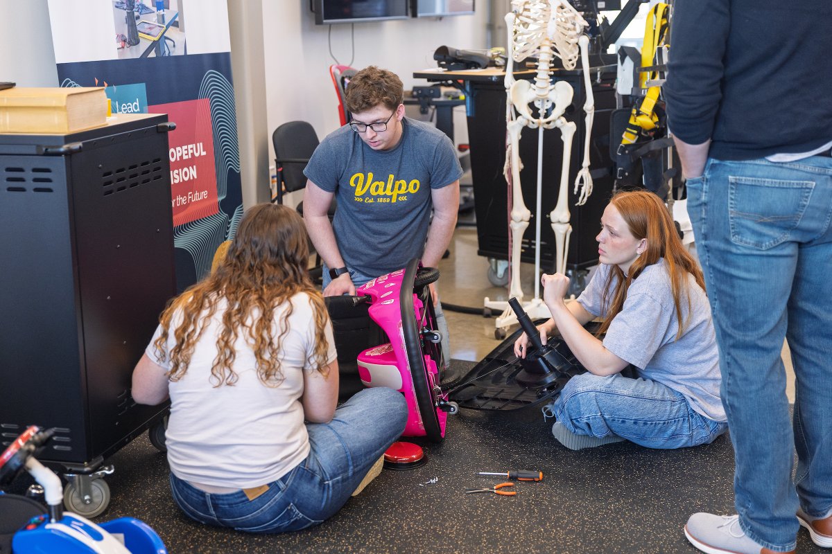 ValpoU's tweet photo. Valpo students are helping create more independence, participation, and joy for children with mobility challenges through GoBabyGo. By combining engineering and occupational therapy, students design adaptive vehicles at no cost to families 🤎💛

Read: https://t.co/8niPRfYNHm https://t.co/fv3qVZb2Ab