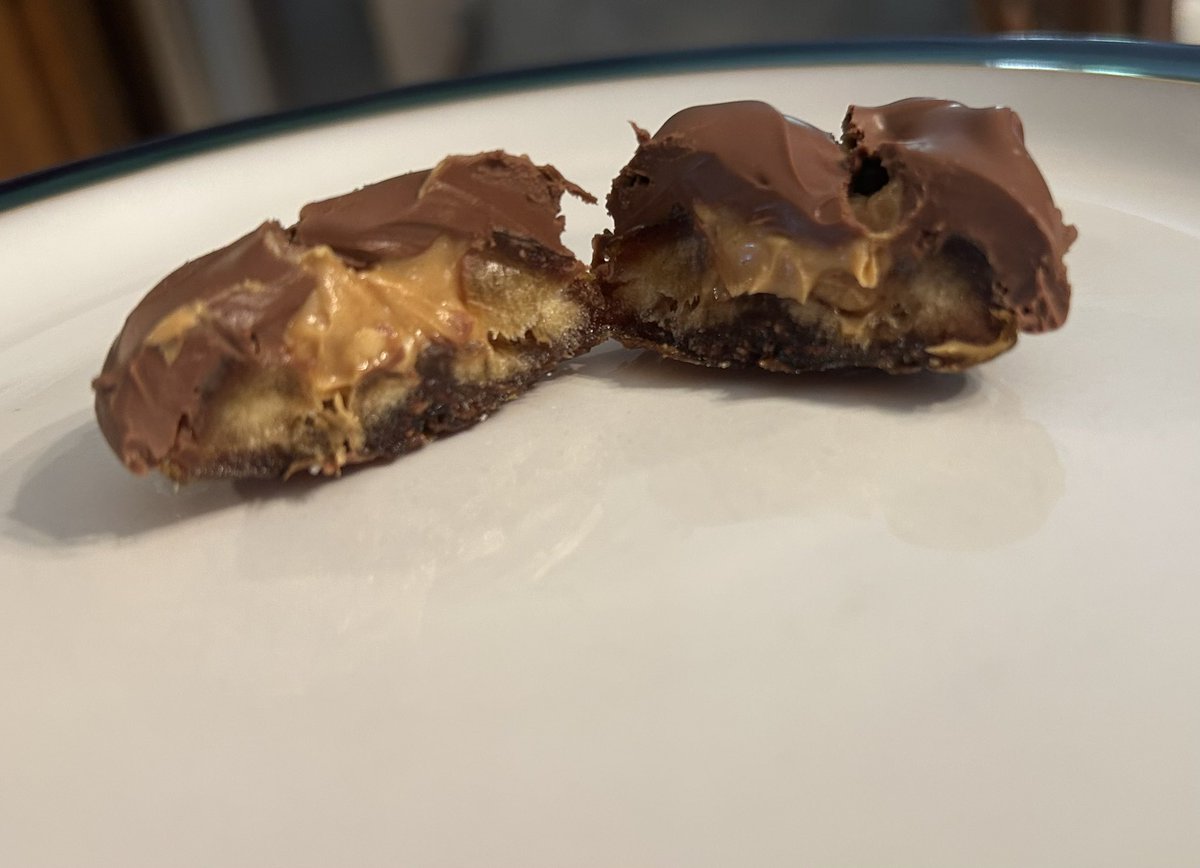 SB_Thompson's tweet photo. I made the viral date “Snickers”. I was lazy &amp; instead of getting peanuts, I just got crunchy peanut butter. 
Dates, PB, peanuts, melted chocolate chips (I used milk chocolate).  Chill til choc is hardened.  

All 7 of us agreed it does, in fact, taste like a snickers! https://t.co/udcN4ztBdq