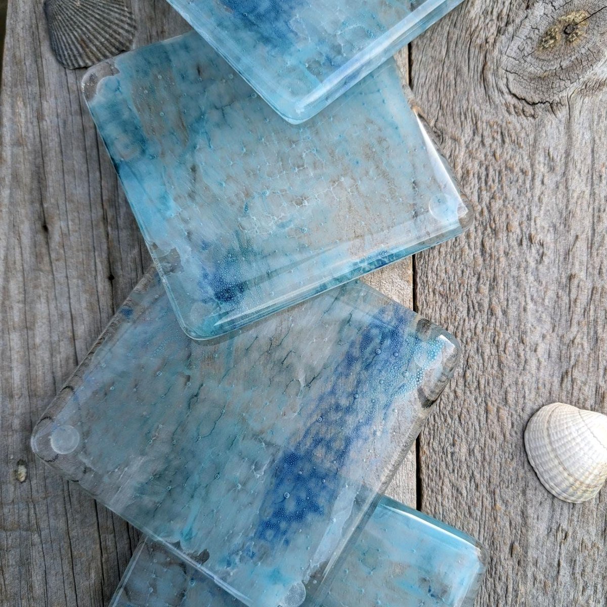 Samphireglass's tweet photo. Beautiful ๐ sea inspired fused glass coasters. Each one is unique with swirls and bubbles of blue, white and green colours. Perfect for the home. Available as single, two, four and eight piece sets โต
#homedeocr #shopindie #giftideas
https://t.co/zcVwbdy1fE... https://t.co/f3JxfGExpI
