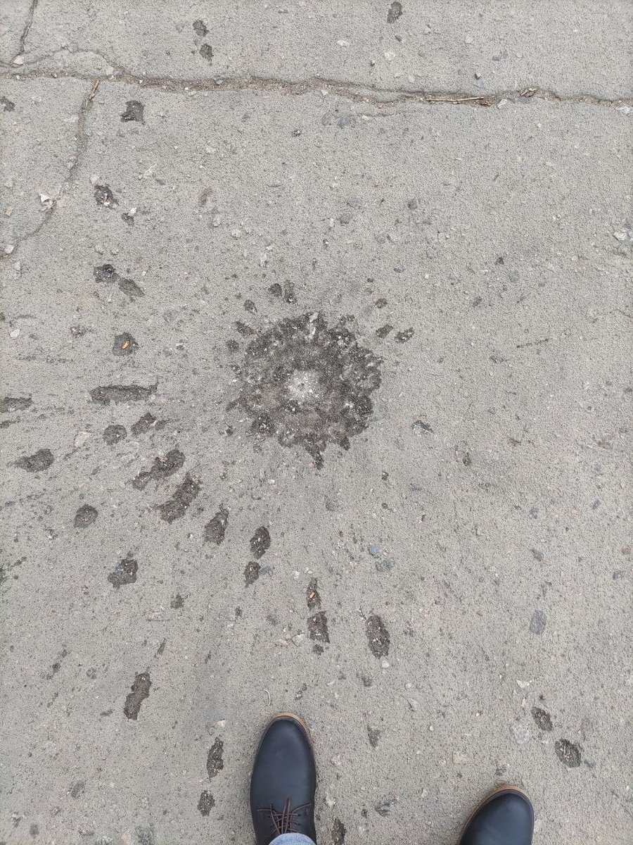 Old_OB's tweet photo. @EclipsePranks @CDinF2 @runews And cluster shell marks on my sidewalk https://t.co/pg5hHxvMaW