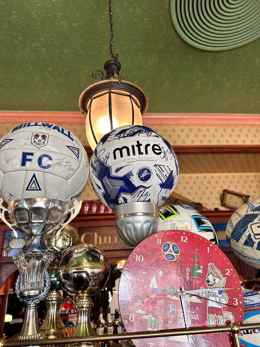 MillwallRussia's tweet photo. Oleg is back home from London and brought a lot of memorabilia souvenirs to Churchill’s Pub! Many thanks to all our Millwall friends who gave these wonderful things to us! It means so much! Millwall everywhere 🦁💙 https://t.co/JlWrvn68Sy