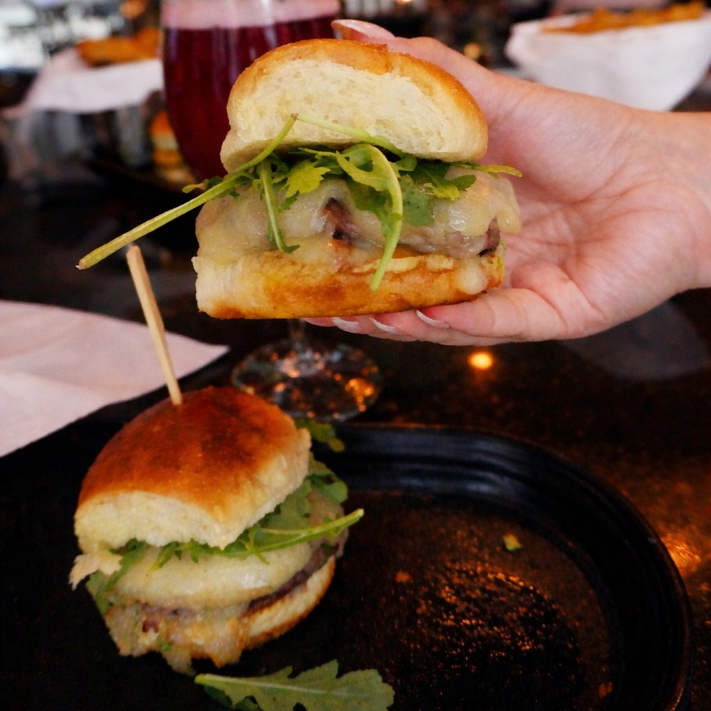 Mortons's tweet photo. Last call for your National Burger Month getaway. 🍔⁣
⁣
Through May 29 only, enjoy three chef-crafted slider pairings inspired by iconic destinations, each served with a cocktail and side, no passport required.⁣
⁣
Available exclusively in the bar + lounge while you can. https://t.co/RhW7YFCcY9