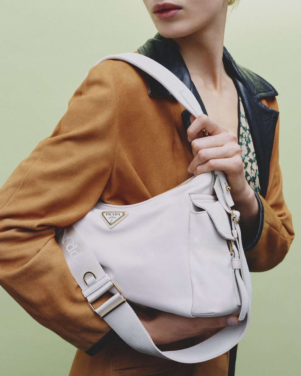 Prada's tweet photo. Prada Explore. 
A continuous exploration that transcends trends and redefines the language of fashion. 
Available in Re-Nylon, suede, and nappa leather. 
Discover more: https://t.co/SScAcIXO61 

#Prada https://t.co/6JarFhWnWC