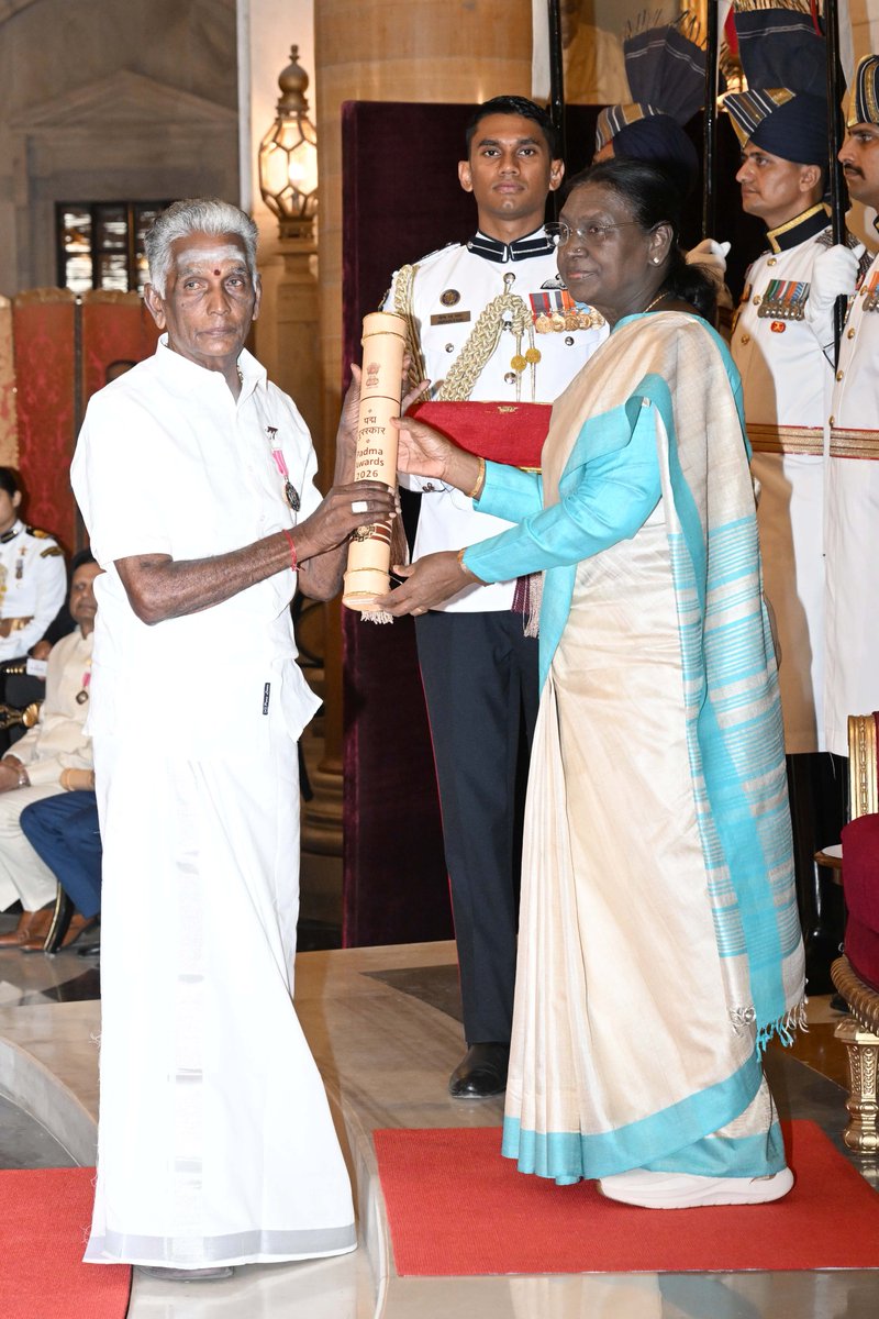rashtrapatibhvn's tweet photo. President Droupadi Murmu presents Padma Shri in the field of Art to Shri N. Swaminathan. Shri N. Swaminathan is an eminent artist in the field of Tamil music. The canonical collection of hymns to Lord Siva in Tamil language, known as Thirumurai, are sung traditionally by Othuvars in Tamil Pann Isai which is the root of present Carnatic music. Of the Othuvars of the present day, he is the supreme artist who is capable of making the audience spell bound during his performances of musical discourse.