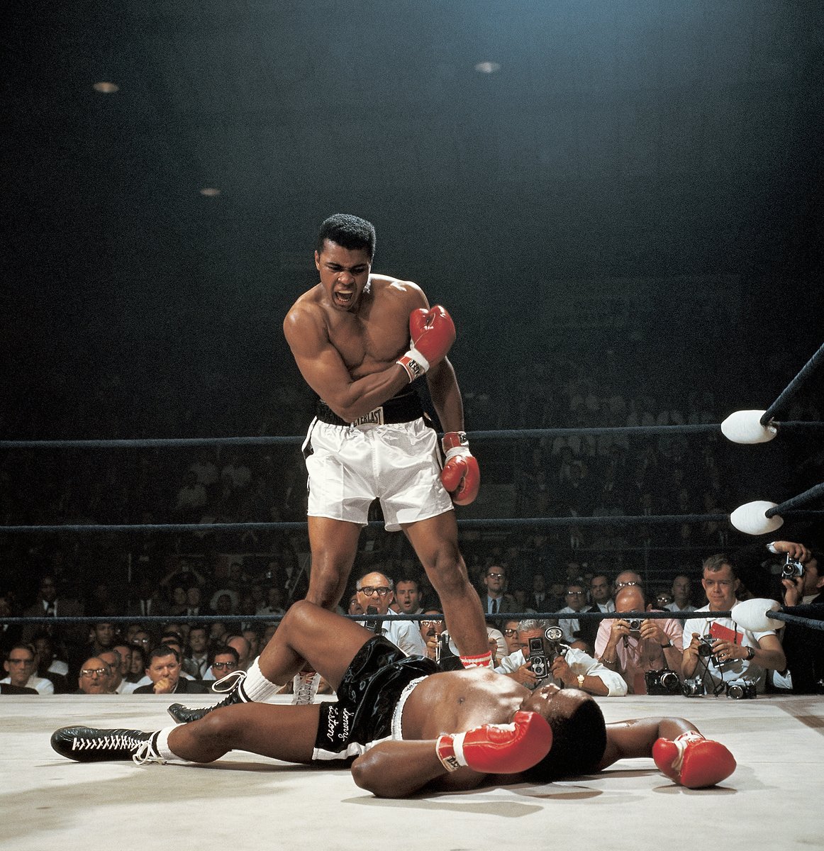 LeiferNeil's tweet photo. On this day in 1965, Muhammad Ali knocked out Sonny Liston in the first round at St. Dominic's Arena.

Lewiston, Maine
May 25, 1965

#NeilLeifer #Photography #Anniversary #MuhammadAli #SonnyListon #Boxing #Sports #StDominicsArena https://t.co/8bargQZzQU