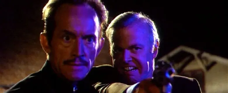 CaptainSpringer's tweet photo. I have a theory about how Reno (Lance Henriksen) and Sam (Kevin Tighe) from the “Tales from the Crypt” episode “Cutting Cards” are actually in love with one another, but the bisexual lighting on their faces in this pic pretty much confirms it. https://t.co/rMxZCFYHFA