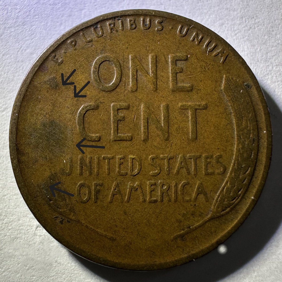 numisdex's tweet photo. Where did the wheat stalk go?

This 1932 Lincoln wheat cent has a grease strike-through that wiped out roughly 75% of the left wheat stalk. Grease built up on the die surface before striking and blocked the design from being impressed into the coin.

Small grease fills in letters are common. Losing most of an entire design element is a different story. The right stalk is fully intact, which makes the missing left side hard to miss.

Found this one coin roll hunting. Still in my collection and not going anywhere.
