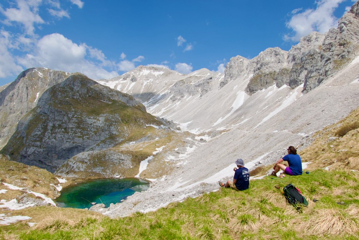 ExploringSlo's tweet photo. Perfect last day in the Slovenian mountains before heading to the Croatian islands tomorrow 🤩 We discovered the most beautiful alpine lake tucked between the peaks of the Julian Alps above the Soča Valley. Wow, wow! 
Join our next Slovenia–Croatia trek 
https://t.co/h7kv6cMNYO https://t.co/sYEJRxwoge