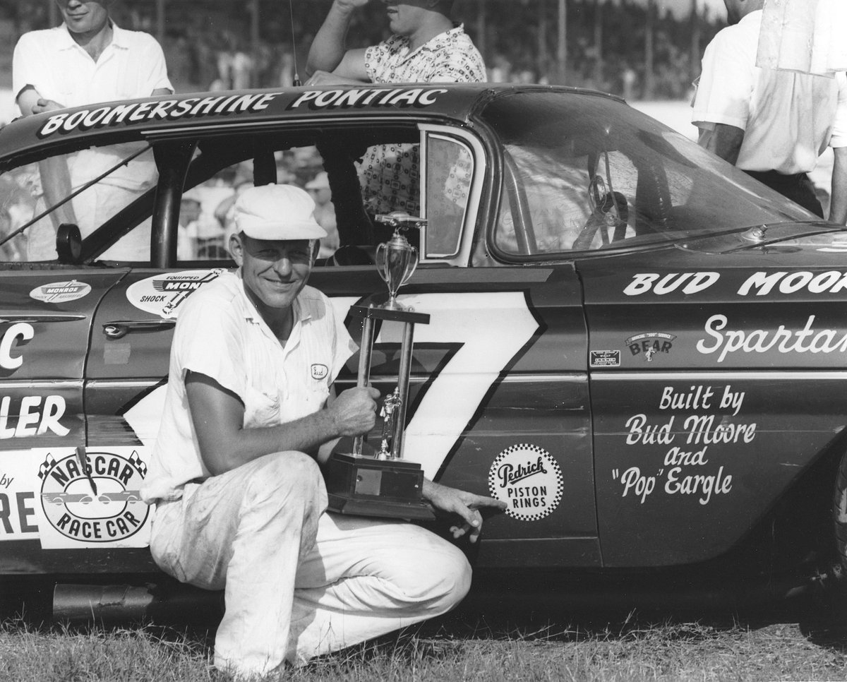 NASCARHall's tweet photo. Today, we honor Hall of Famer Bud Moore, a decorated World War II veteran and championship‑winning NASCAR team owner whose influence spanned more than four decades. He was the leader behind two premier series championships and 63 race victories, guiding drivers such as Joe Weatherly, Dale Earnhardt, and Bobby Allison.