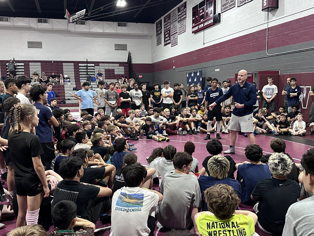 JavierJMorales's tweet photo. .@pennstateWREST coach Cael Sanderson, who has led the Nittany Lions to 13 national titles, including the last five, was working with the young wrestlers at the RBY x KD Wrestling Clinic at Desert View earlier this morning. Sanderson coached @SSBDwrestling great Roman Bravo-Young from 2018-23, a time in which RBY won two national titles and was a four-time All-American. Having Sanderson here offering his words of wisdom is like having Nick Saban working with football players and John Wooden with basketball players. Tucson certainly had a brush with greatness today.