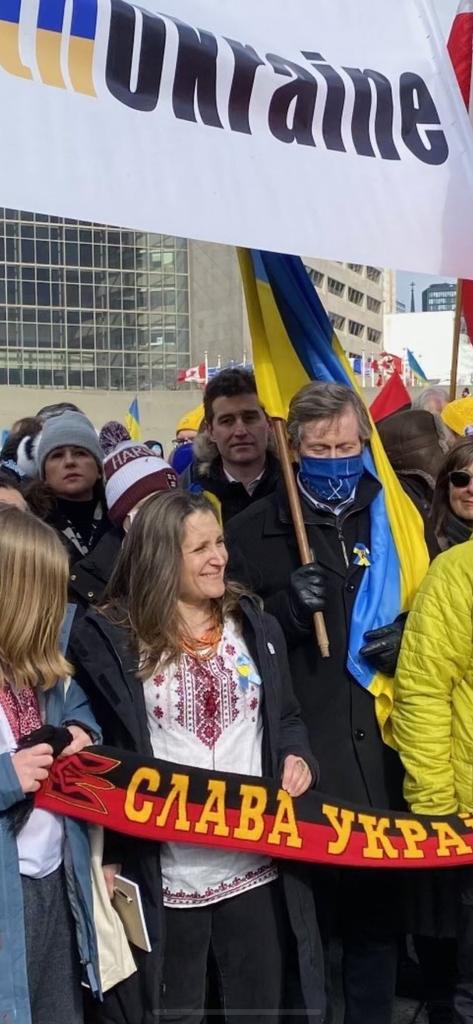 dws316's tweet photo. @OunkaOnX This flag she is holding is the blood and soil flag. It was used the Nazi collaborator Stepan Bandera. Good fellow soldier Jaroslav Hunka received the standing occasion in the Canadian parliament.

https://t.co/ZWb8UHGCAX https://t.co/7Kah6Yuaxi