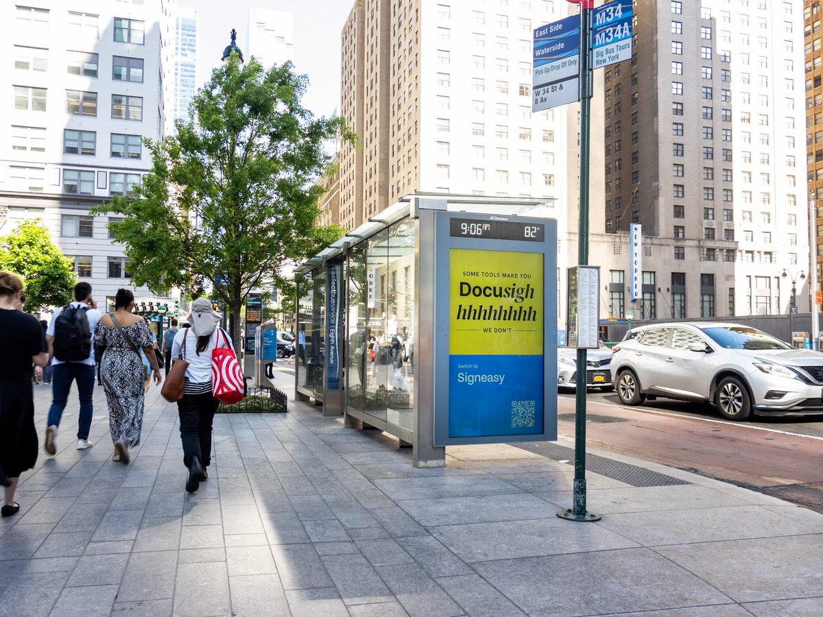 Ronycoder's tweet photo. Seeing a company take on Docusign on buses and LED trucks across New York City is not something you see every day 👀

But honestly… it's probably going to resonate with a lot of teams.

Because contract management has quietly become one of those software categories people just tolerate.

Too much complexity. Too much overhead. Too many pricing complaints with nowhere to go. 

Challenger brands usually market this publicly when they think market sentiment is already shifting. Looks like @GetSigneasy thinks it is. Taking this message directly into the streets of NYC is a pretty confident move.

The QR code takes us here: https://t.co/cHfmkc4yAu