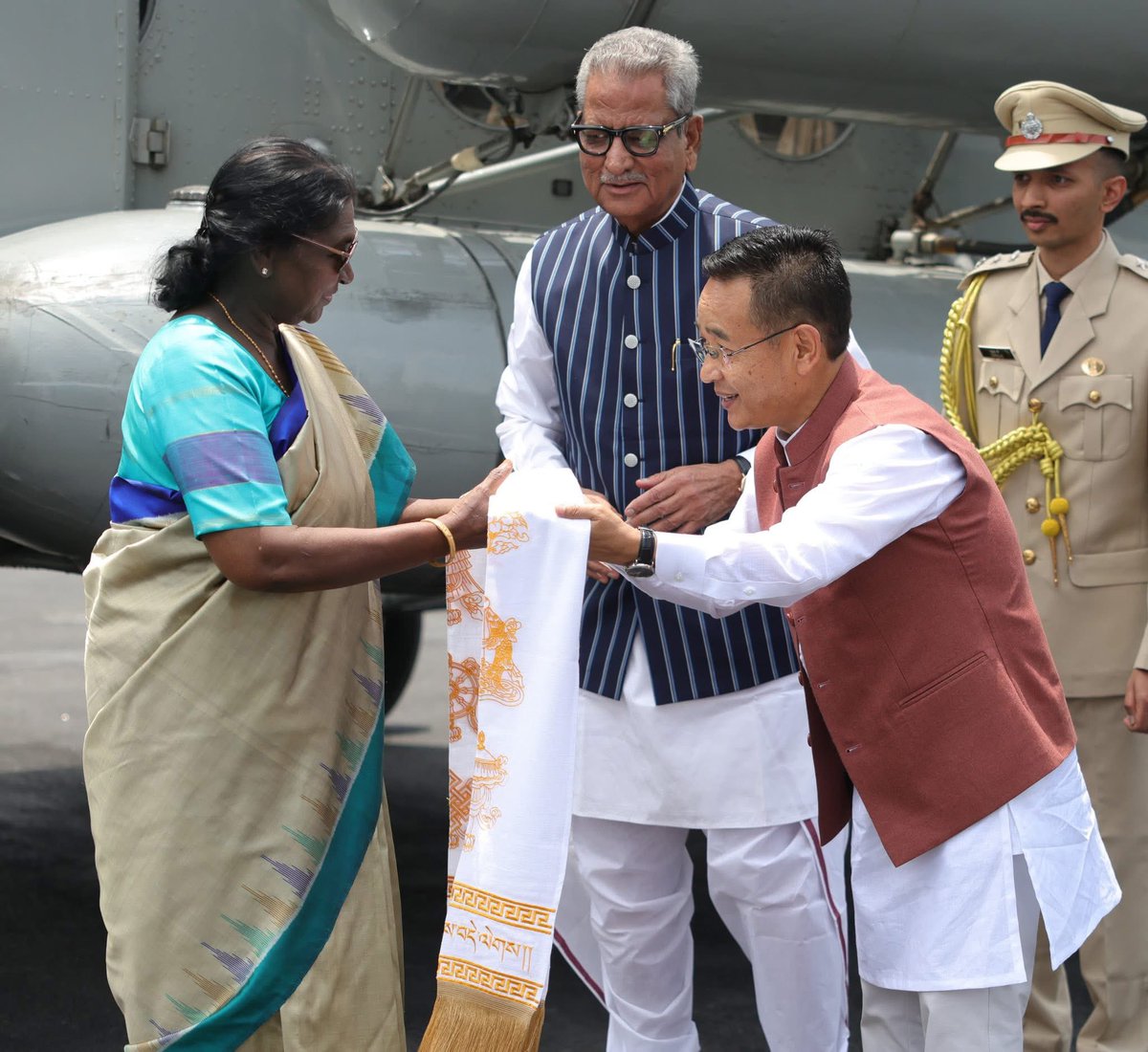 PSTamangGolay's tweet photo. I had the honour of receiving Hon’ble President Smt. Droupadi Murmu Ji, at Libing Helipad today in the gracious presence of Hon’ble Governor Shri Om Prakash Mathur Ji, along with my Cabinet colleagues and senior officials.
@rashtrapatibhvn 
@OmMathur_Raj https://t.co/3JB6FH3mly