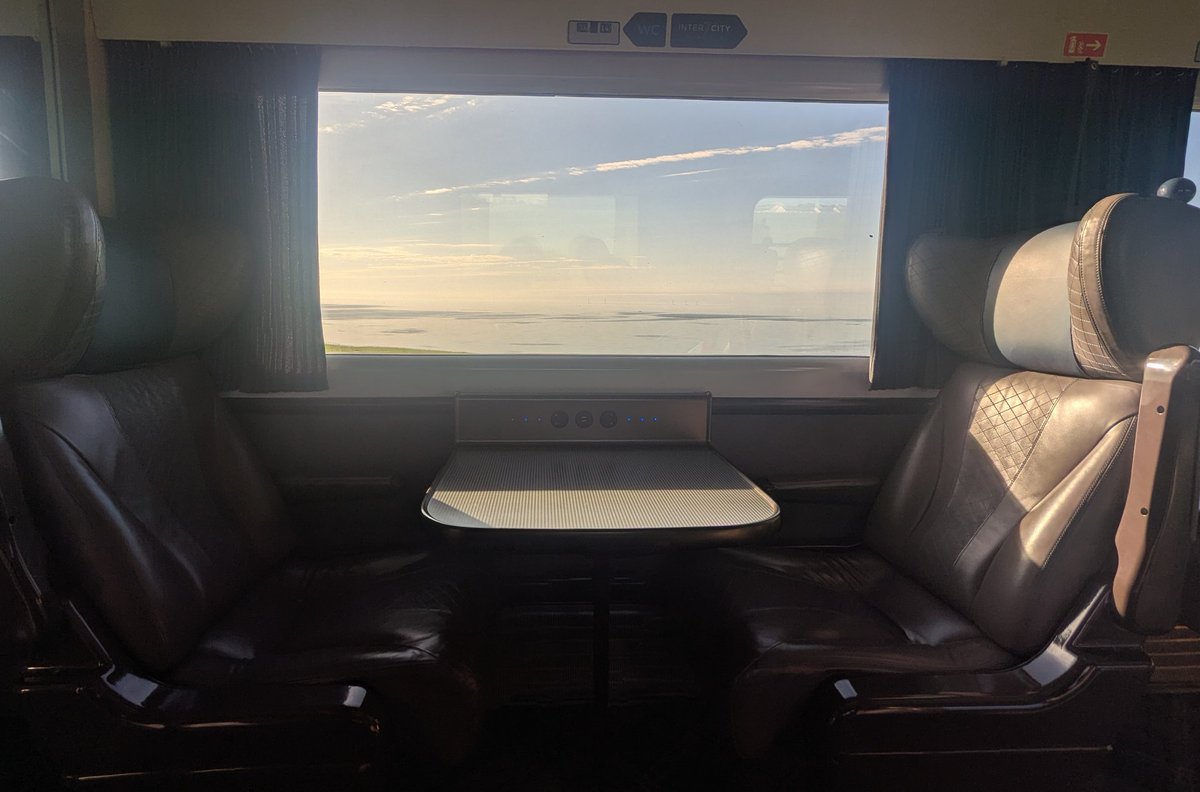 CNERail's tweet photo. Stunning views out over the sea from the train departing Aberdeen today. Wind turbines on the horizon.

We must reconnect Fraserburgh, Peterhead and Ellon to the rail network, for tourism, for industry, for  people. https://t.co/0n7L7oSdX7