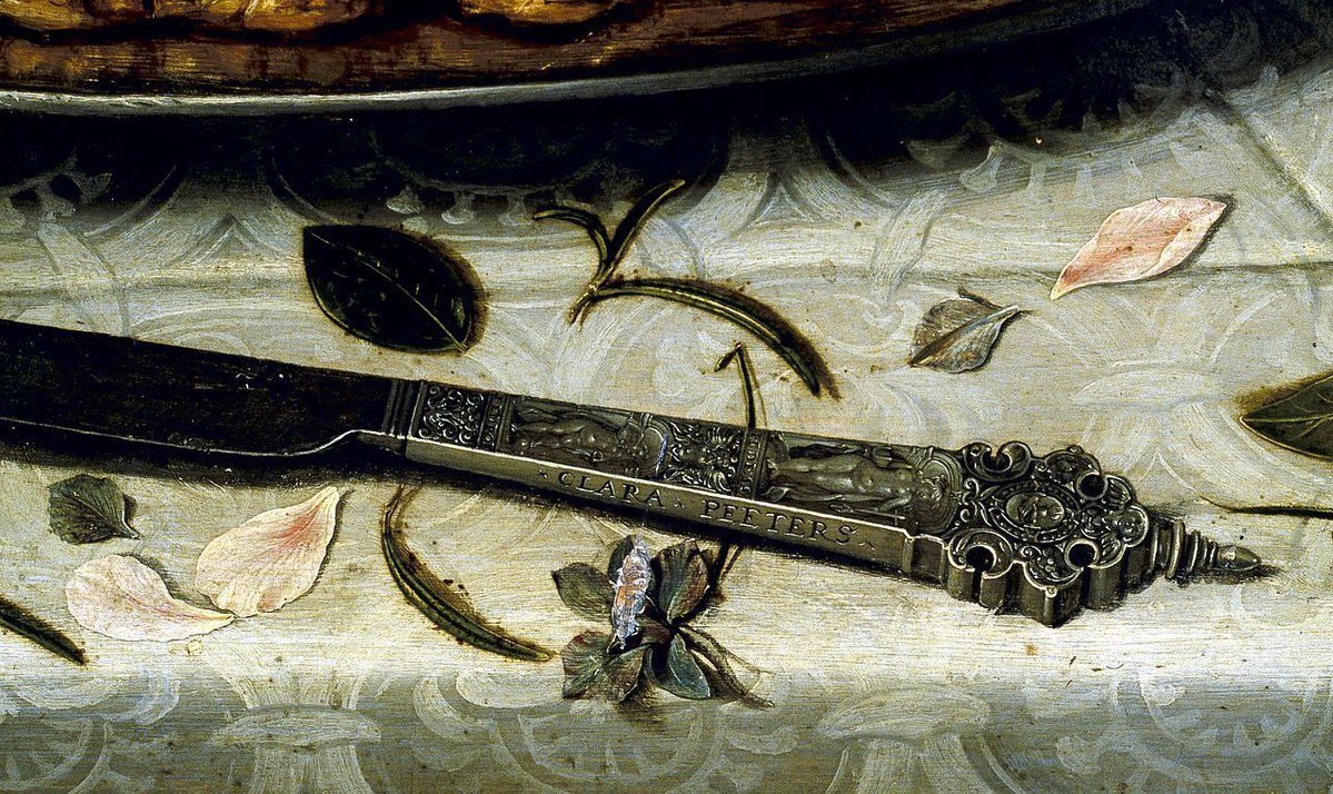 Desailaur's tweet photo. Clara Peeters dejó su firma en un cuchillo… y su legado en la historia del arte.

Esta pintora flamenca del siglo XVII (1594-1657) fue una de las grandes maestras del bodegón. Con una precisión casi fotográfica, plasmaba objetos cotidianos cargados de simbolismo y belleza. https://t.co/yBB36x01iD