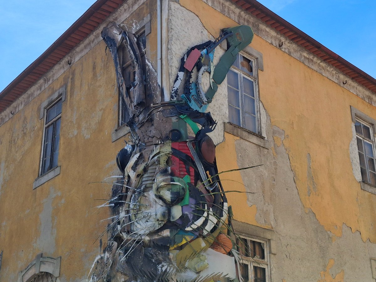 Officebreaks's tweet photo. The amazing half rabbit sculpture in Vila Nova de Gaia in Porto - made entirely from recycled rubbish. https://t.co/uQf8k3gDdQ