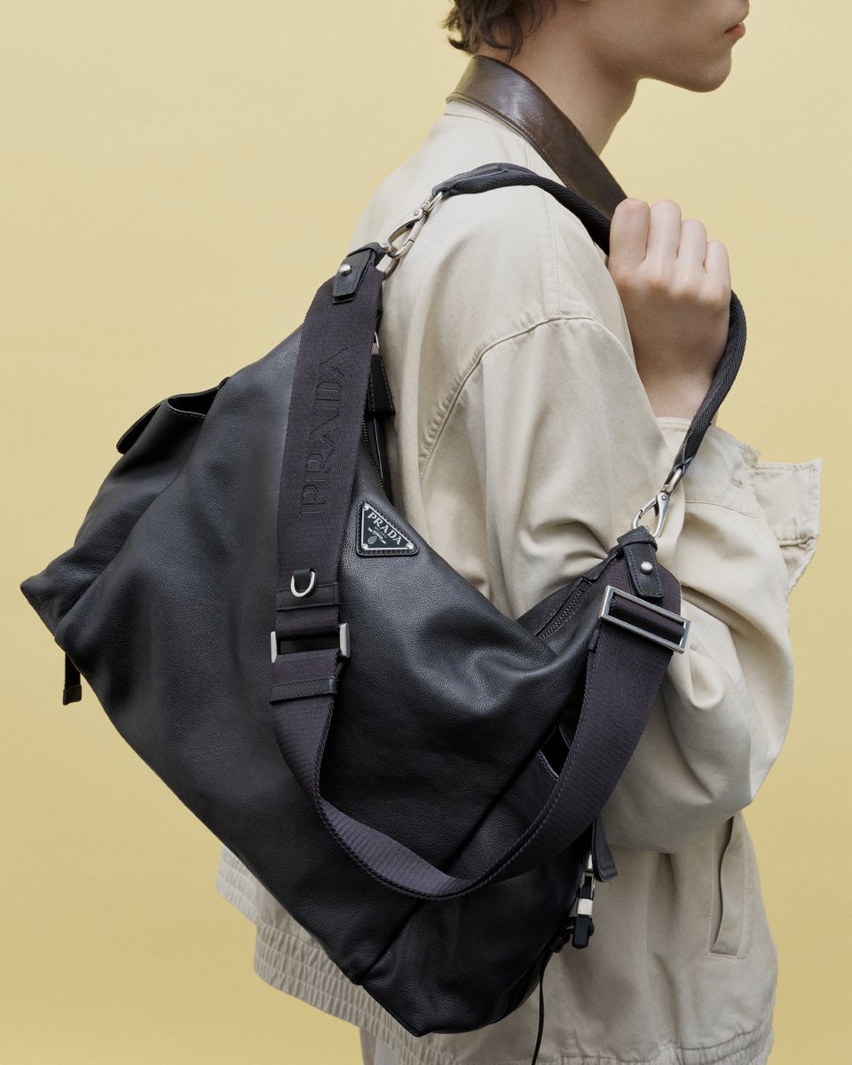 Prada's tweet photo. Prada Explore reimagines a function-led piece as a statement of style. 
A trusted companion for urban and outdoor journeys, crafted to stay by the wearer’s side on every adventure. 
Discover more: https://t.co/MBJ1dgE45G 

#Prada https://t.co/dRQuDVQ2HR