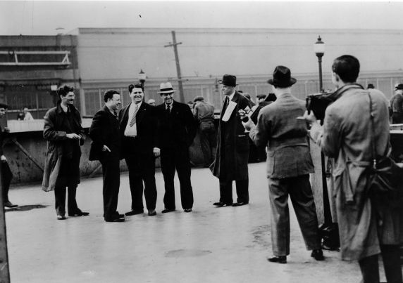 UAW's tweet photo. On this day in 1937, nearly sixty UAW members from Local 174 arrived at Ford Motor Company’s River Rouge Plant to pass out leaflets, with city permit in hand, as part of a campaign to secure union representation for Rouge workers. Several neutral observers were also present, including clergy, reporters, and photographers. 

In order to access the greatest number of workers, participants met at the pedestrian overpass on Miller Road at Gate 4 of the complex during a shift change. As UAW leaders Walter Reuther, Robert Kantor, Richard Frankensteen, and J.J. Kennedy posed for photographers, they were approached by members of the Ford Service Department and severely beaten. Women from UAW Local 174’s Ladies Auxiliary, reporters, and photographers standing below the overpass were also attacked.

Detroit News photographer James Kilpatrick captured the beatings in vivid detail. When men from the Service Department threatened Kilpatrick and demanded that he turn over his film, the photographer concealed the actual negatives and gave them blank plates instead. 

Over the next few days, widespread publication of photos from the “Battle of the Overpass” made headlines across the country. The photos, in conjunction with testimony during the subsequent hearings from medical personnel who treated the injured, brought national attention to the brutal methods utilized by Ford and other companies to fight union organizers. This victory in public opinion was crucial for further advances by organized labor.

As one of the most famous events in the history of the American labor movement, the “Battle of the Overpass” set in motion a series of efforts that resulted in a crippling strike at the Rouge Plant and final recognition of the UAW by the Ford Motor Company in 1941. It also cemented Walter Reuther’s importance within the UAW and paved the way for his pivotal years as president.

📸 @ReutherLibrary