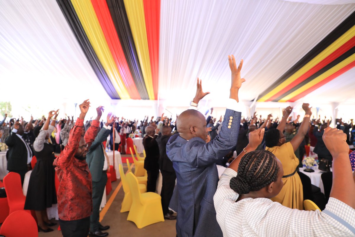 Parliament_Ug's tweet photo. 📸 After hours of sitting during the orientation exercise, Members of Parliament take a health break, led by our wellness and fitness coach, Robert Ssebugwawo. #12thParliamentStarts https://t.co/yE6G9Vn9y7