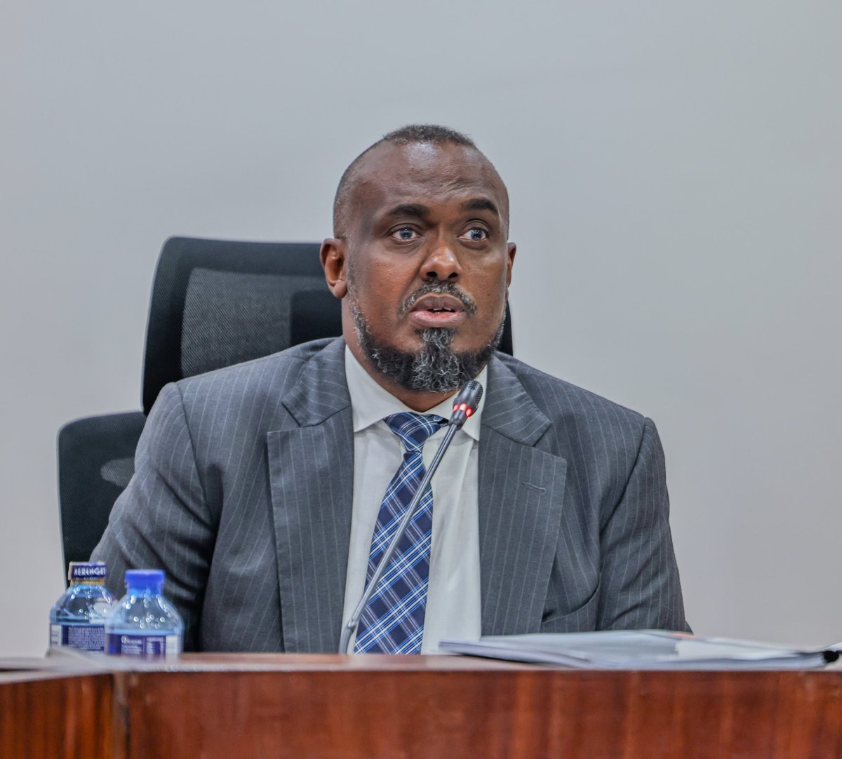KeTreasury's tweet photo. This afternoon, CS Hon. FCPA John Mbadi Ng’ongo, EGH, @JohnMbadiN  appeared before the National Assembly’s Public Debt and Privatisation Committee chaired by Hon. Shurie Abdi Omar regarding the FY 2026/2027 Consolidated Fund Services (CFS) Expenditures.

The CS outlined the country’s economic outlook, highlighting Kenya’s continued economic resilience despite global uncertainties, including geopolitical tensions, inflationary pressures and volatility in international markets. He noted that Kenya’s economy continues to perform strongly, supported by growth in key sectors such as construction, ICT, tourism, financial services and mining.

Hon. Mbadi also briefed the Committee on the Government’s macro-fiscal framework guiding the FY 2026/27 Budget, measures being implemented to safeguard economic stability, and efforts to maintain sustainable public debt management.

The engagement forms part of Parliament’s @NAssemblyKE oversight role in examining and approving the Government’s fiscal plans and Consolidated Fund Services expenditures for the upcoming financial year.