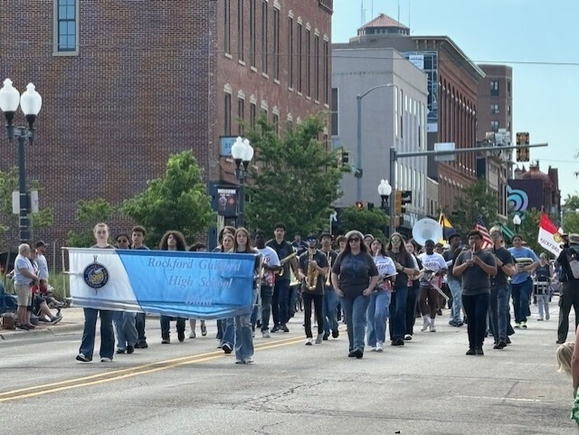 RPS205's tweet photo. RPS was well represented at Rockford's Memorial Day parade yesterday. Bands from all four high schools and West Middle School marched through downtown to honor and remember fallen heroes. https://t.co/Eml68zWm93